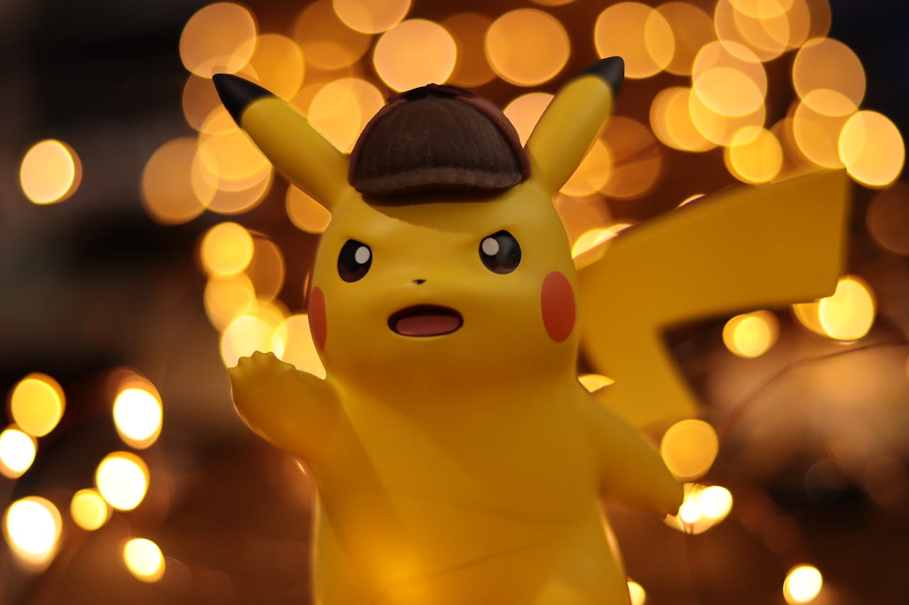 A close-up of a Pikachu figurine illuminated by a warm bokeh effect, creating an eye-catching visual.